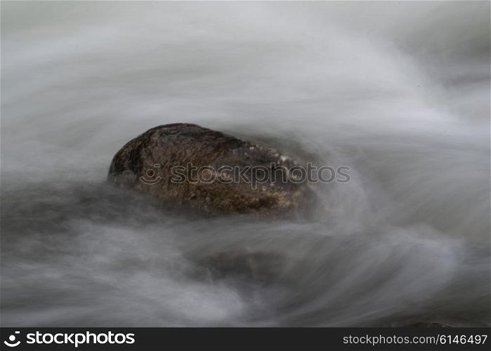 View of rock in river, Whistler, British Columbia, Canada