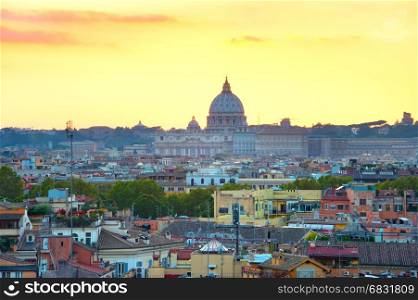 View of Rome at sunset with St Peter Cathedral. Italy