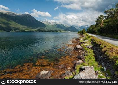 View of Romsdalsfjorden in Norway under a sunny sky. View of Romsdalsfjorden in Norway