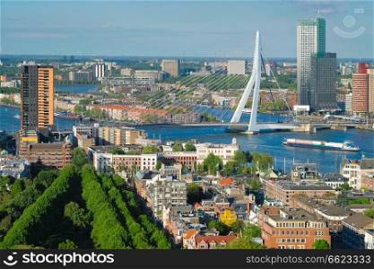 View of Rotterdam city and the Erasmus bridge Erasmusbrug over Nieuwe Maas river from Euromast. View of Rotterdam city and the Erasmus bridge