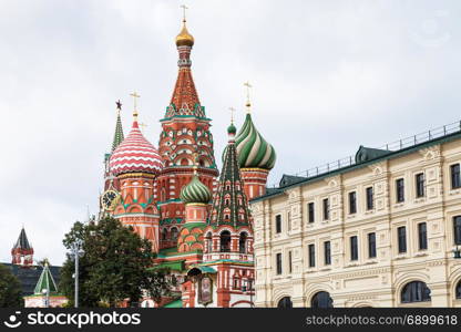 view of Saint Basil Cathedral (Pokrovsky Cathedral) on Red Square of Moscow Kremlin from Varvarka street in september
