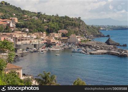View of Sea port and houses at Acireale - Italy.