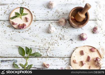 View of several heads of garlic, prepared for cooking