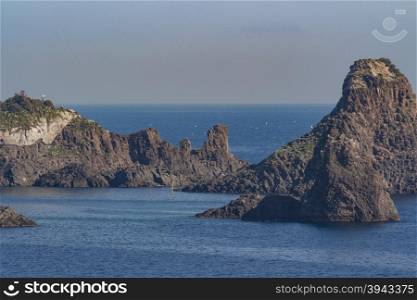 "View of sicilian rocks on sea "Faraglioni""