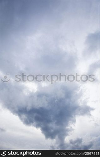 View of sky with large cumulus cloud formation.