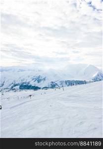 View of snowcapped mountains. Ski resort. Winter sport. Snowy mountains of Gudauri Georgia. View of snowcapped mountains. Ski resort