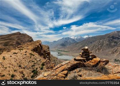 View of Spiti valley in Himalayas with stone cairn. Spiti valley, Himachal Pradesh, India. View of Spiti valley Himalayas with stone cairn . Spiti valley, Himachal Pradesh, India