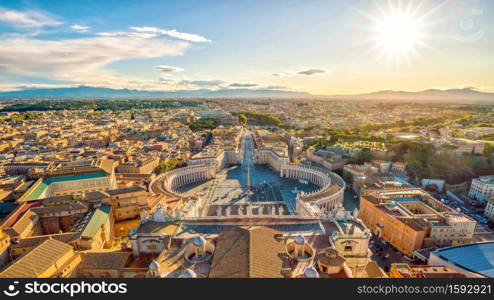 View of St. Peter Square and Rome skyline from the Dome of St. Peter Basilica in Vatican, Italy