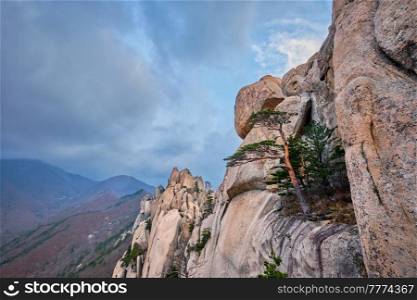 View of stone and rock formations from Ulsanbawi rock peak in stormy weather. Seoraksan National Park, South Corea. View from Ulsanbawi rock peak. Seoraksan National Park, South Corea