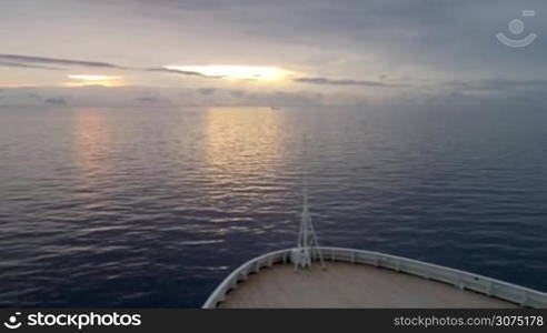 View of sunrise over Brabant Island, seen from a cruise ship. Gerlache Strait, Antarctica.