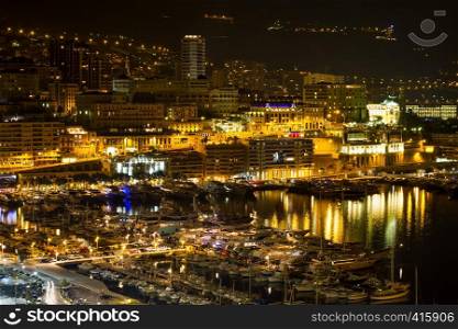 View of the bay with yachts in Monaco at night
