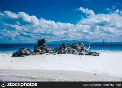 View of the beach with the rock in Sali Island, Myanmar