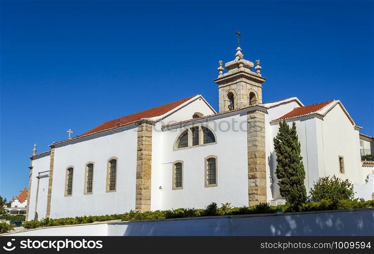 View of the bell tower and lateral walls of the early 16th century Parish Church of Saint Anthony of Estoril, Portugal