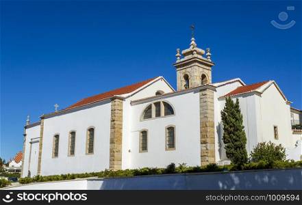 View of the bell tower and lateral walls of the early 16th century Parish Church of Saint Anthony of Estoril, Portugal