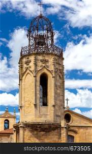 View of the bell tower with the church bell of the Holy Ghost on a sunny day. France. Provence. Aix-en-Provence.. Aix-en-Provence. The bell tower of the old church of the Holy Ghost.