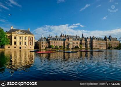 View of the Binnenhof House of Parliament and Mauritshuis museum and the Hofvijver lake. The Hague, Netherlands. Hofvijver lake and Binnenhof , The Hague