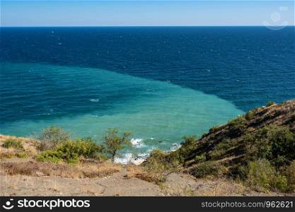 View of the Black Sea from the high coast on a summer sunny day, Crimea.