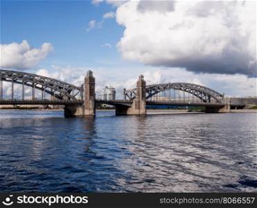 view of the bridge across the Neva river. The view from the waterfront to the bridge across the Neva river