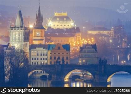 View of the bridge over the Vltava at sunset from a height.. Prague. Bridge over the Vltava at night.