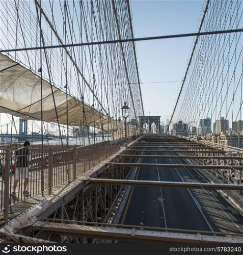 View of the Brooklyn Bridge with buildings in the background, Manhattan, New York City, New York State, USA