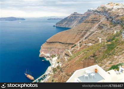 View of the caldera, the old harbor and the road to it in Fira. Santorini.