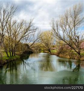 View of the Carrion river in the city of Palencia (Castile and Leon), Spain