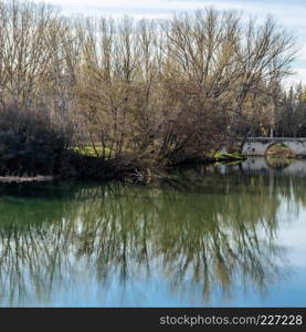 View of the Carrion river in the city of Palencia (Castile and Leon), Spain