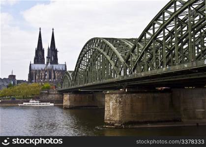 view of the cathedral of cologne and the hohenzollern bridge