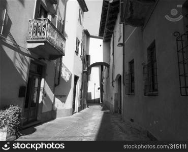 View of the city centre of Alba, Italy in black and white. View of the city of Alba in black and white