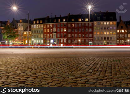 View of the city embankment in the night lighting. Copenhagen. Denmark.. Copenhagen. City embankment at night