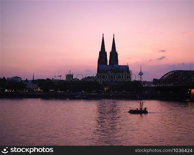 View of the city in Koeln, Germany From The River At Night. View of Koeln