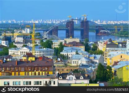 View of the city Kiev and the Dnieper River with a new bridge. Capital of Ukraine - Kyiv.