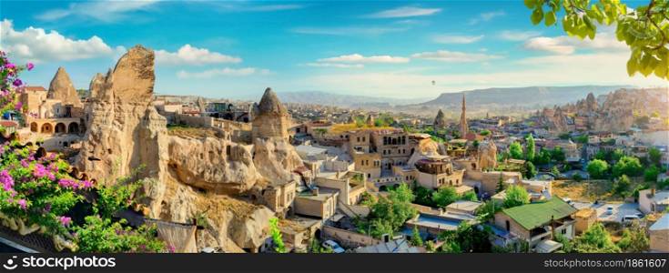 View of the city of Goreme with caves. Panorama of Goreme city