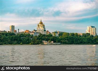 View of the city of Khabarovsk from the Amur river. Urban landscape in the evening at sunset. View of the city of Khabarovsk from the Amur river. Urban landscape in the evening at sunset.