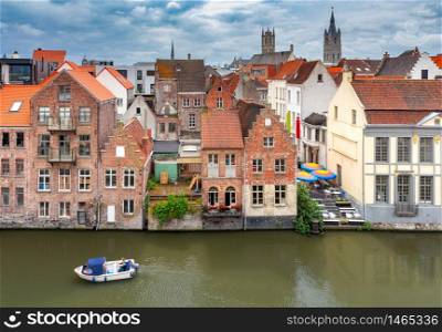 View of the city promenade and the facades of medieval houses. Ghent. Belgium.. Gent. City embankment in the old city.