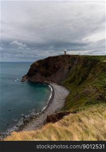 View of the cliffs at Hartland Point in Devon with the United Kindom RAF radar station perched on the clifftop