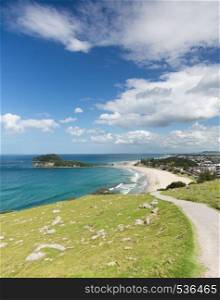 View of the coastline and town of Tauranga from the Mount in New Zealand. Hike around The Mount at Tauranga in NZ