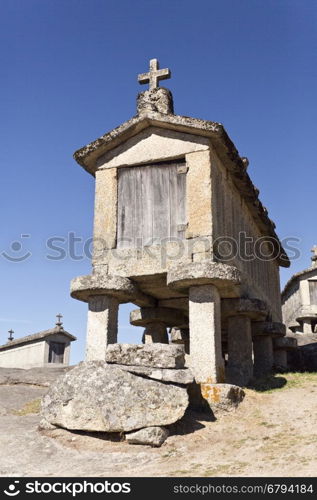View of the communitarian granaries, called espigueiros, in the village of Soajo, Peneda National Park, Northern Portugal