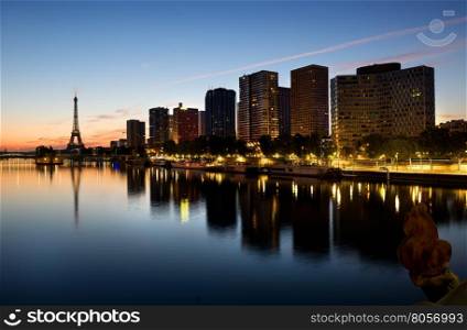 View of the Eiffel tower and Seine river at sunrise, Paris