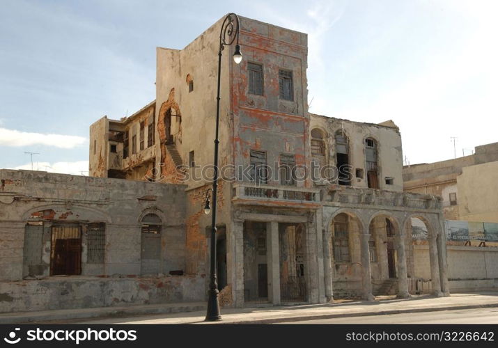 View of the facade of an abandoned commercial building, Havana, Cuba