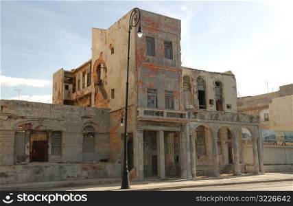 View of the facade of an abandoned commercial building, Havana, Cuba