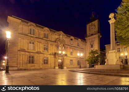 View of the facade of the old city hall in night illumination. France. Provence. Aix-en-Provence.. Aix-en-Provence. The facade of the city hall at dawn.