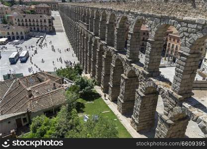 View of the famous Aqueduct of Segovia. Roman construction of the 1st century. Travel concept. Spain, Castile and Leon, Segovia. 