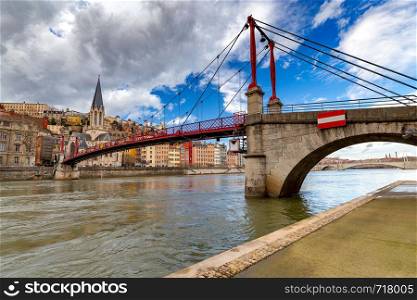 View of the famous bridge of St. George over the river Sona. Lyon France.. Lyon. St. George's Bridge over the River Saona.