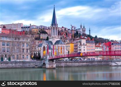 View of the famous bridge of St. George over the river Sona. Lyon France.. Lyon. St. George's Bridge over the River Saona.