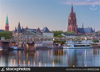 View of the famous Frankfurt St. Bartholomew&rsquo;s Cathedral and the river Main at sunset. Germany.. Frankfurt St. Bartholomew&rsquo;s Cathedral and city embankment at sunset.
