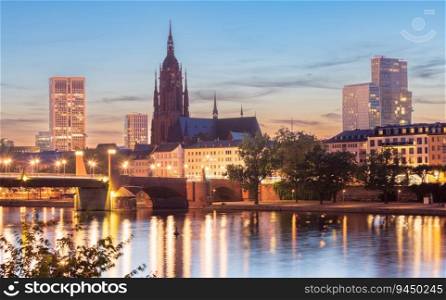 View of the famous Frankfurt St. Bartholomew’s Cathedral and the river Main at sunset. Germany.. Frankfurt St. Bartholomew’s Cathedral and city embankment at sunset.