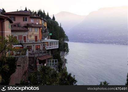 view of the famous terrace in a small town Tremosine at dawn. Italy.
