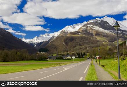 view of the french Pyrenees mountains in spring time with snow