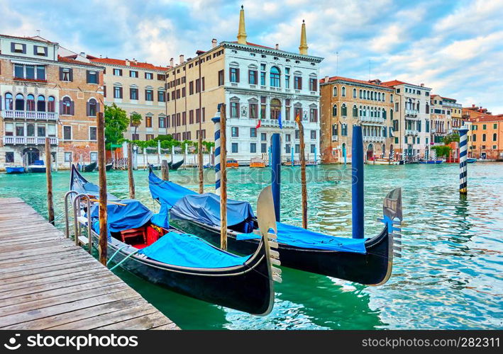 View of The Grand Canal in Venice with two moored gondolas, Italy
